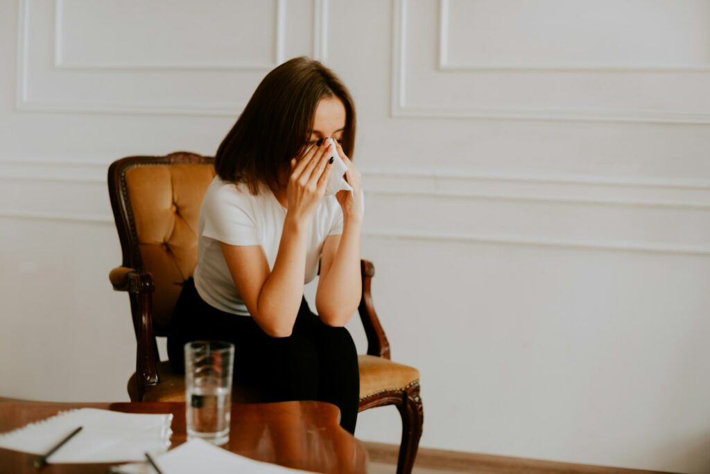 Woman in chair crying